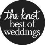 A dark circular badge with pale cursive text reading &ldquo;the best best of wedding&rdquo; arranged in multiple lines inside the circle.